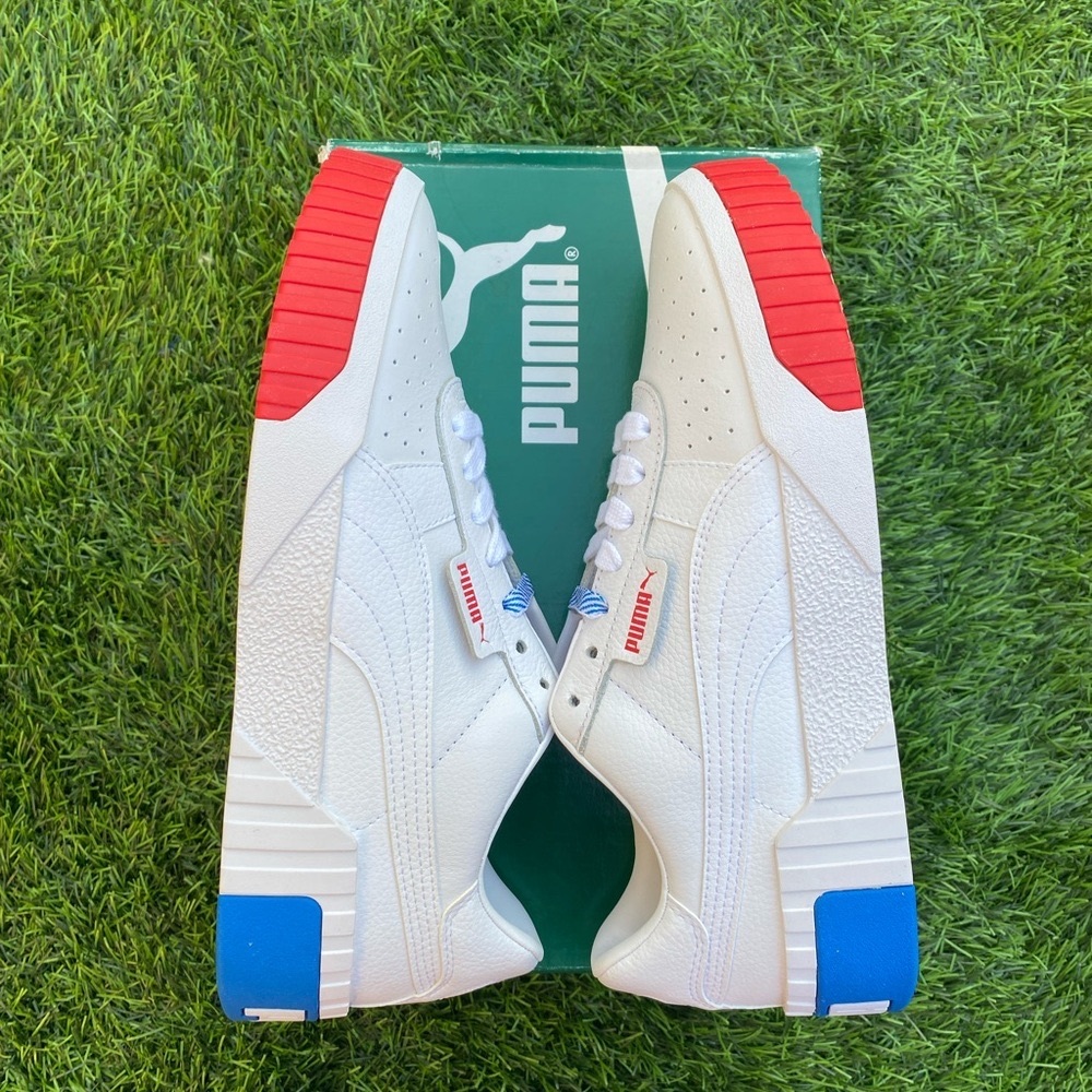 PUMA WOMEN'S CALI
Color: White-high Risk Red-indigo Bunting       Size 9 women’s